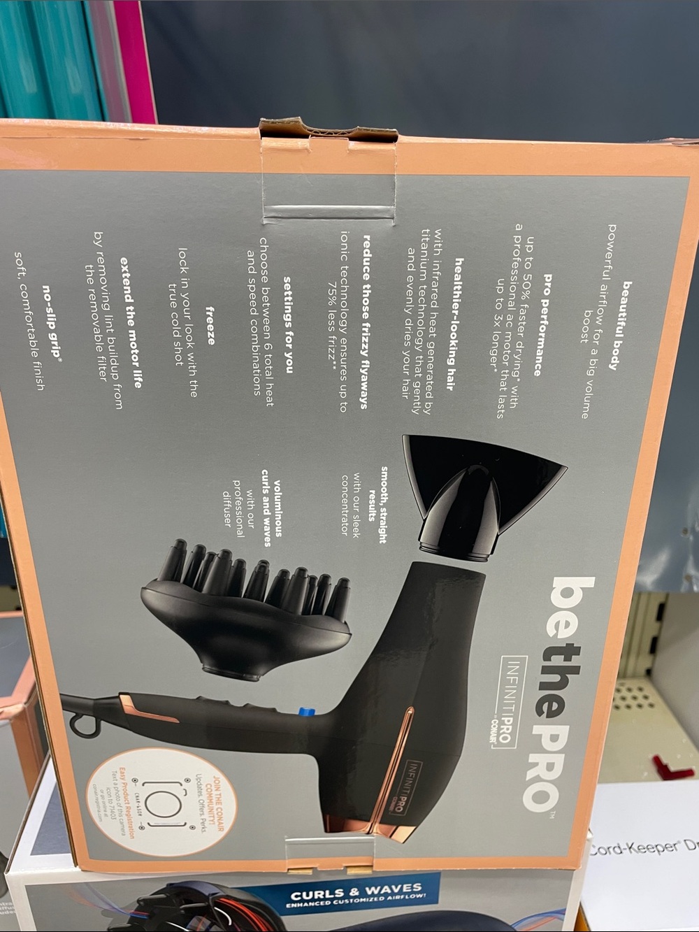 be the PRO Infiniti Pro Hair Dryer in Black with Rose Gold Accents